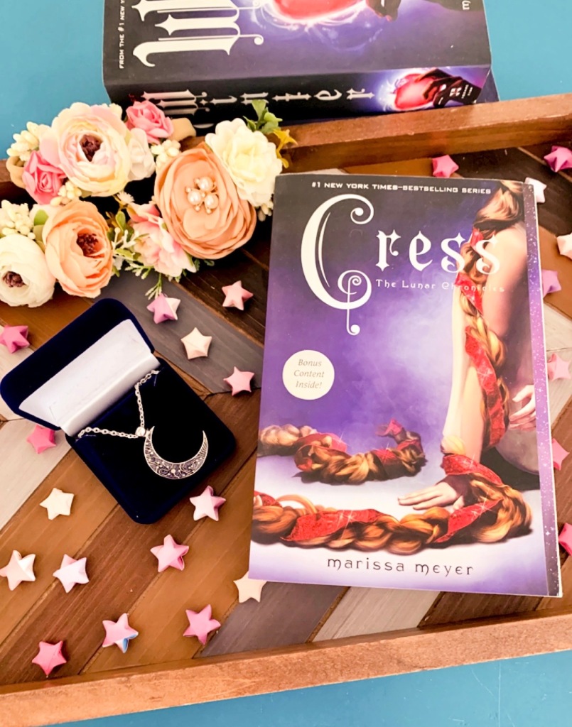 Cress (the lunar chronicles, #1) by marissa meyer picture taken by @deesreadingtree